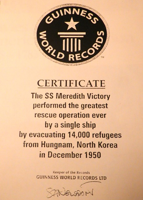 The Meredith Victory receives a certificate from the Guinness Book of World Records. (Guinness World Records).